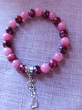 Bracelet en perles fantaisie dans les tons de roses - Collection spéciale Octobre Rose = Cœur de de Grenadine