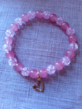 Bracelet en perles fantaisie dans les tons de rose - Collection Octobre Rose = cœur de rosée -