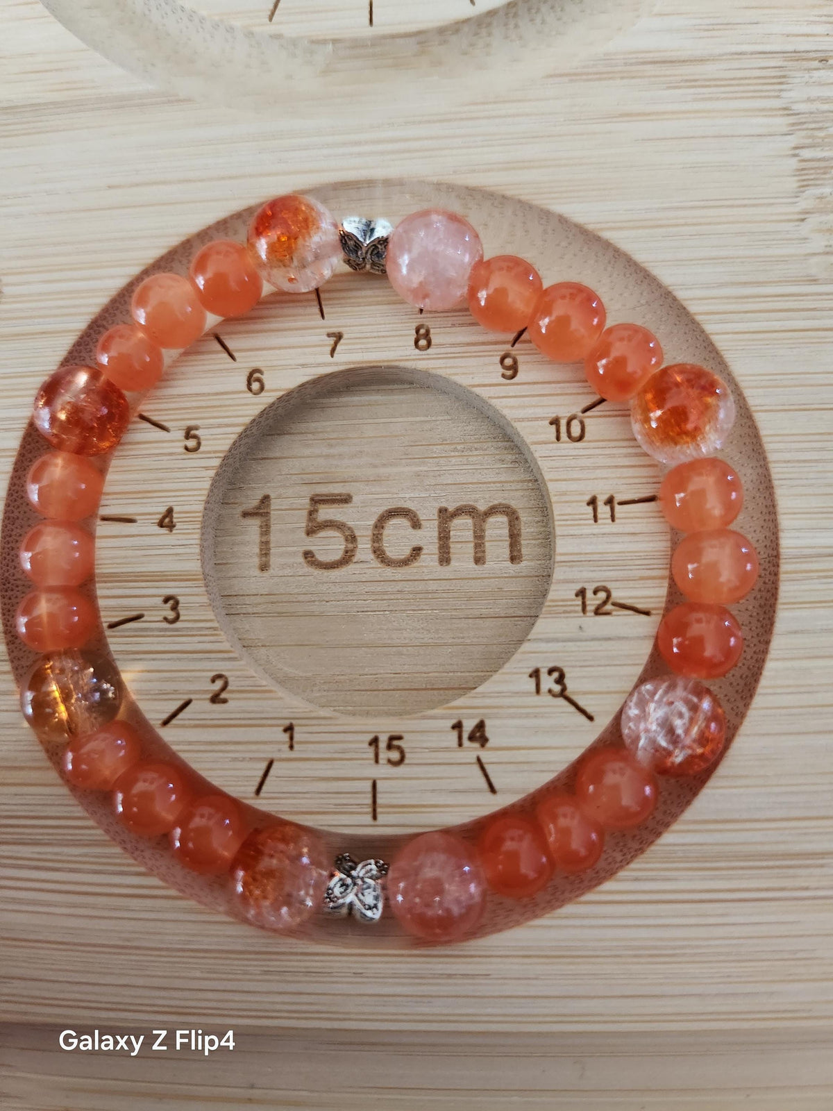 Bracelet fantaisie Solaris, perles orangées sur fil élastique 15 cm