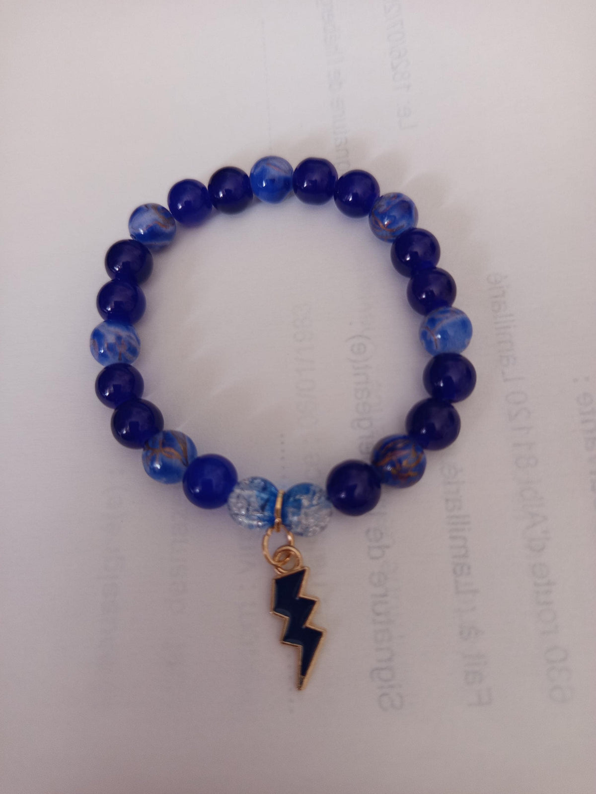 Cadeau Femme, Bracelet Perles Bleues Élastique avec Pendentif Éclair Neptune