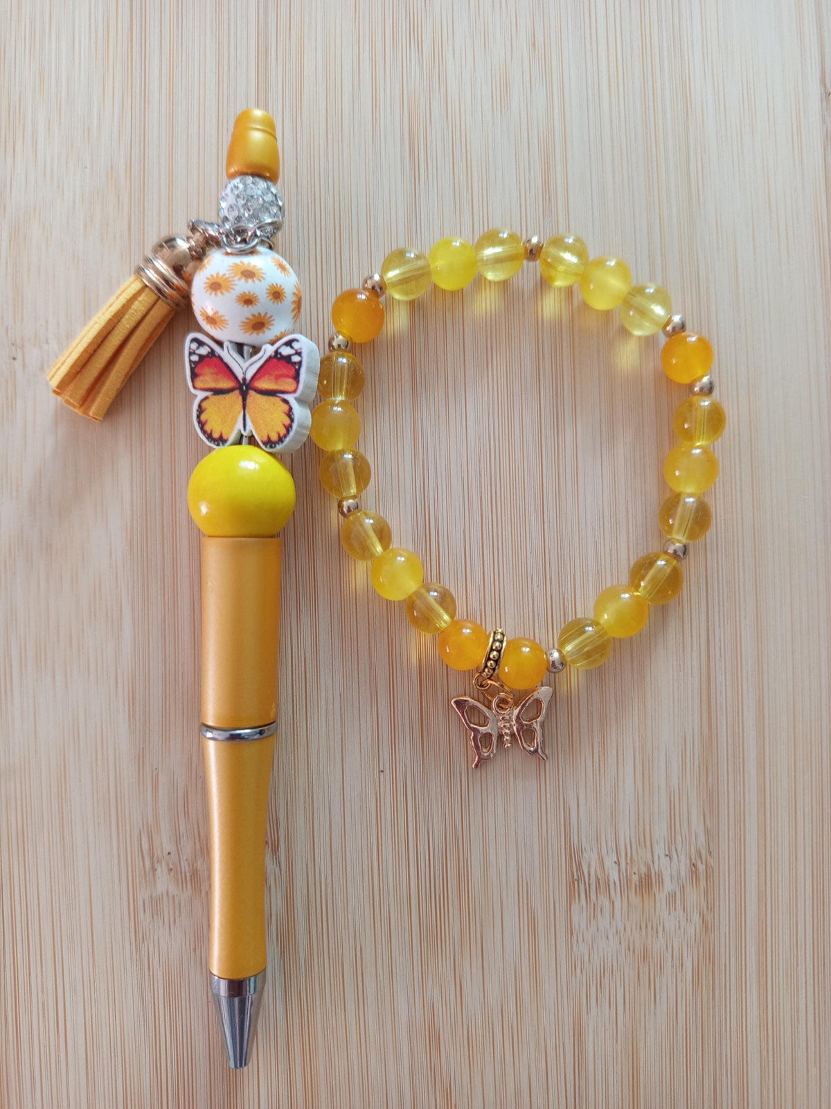 Bracelet en perles fantaisie et Stylo Jaune Doré avec Papillon - Epi d'Or -