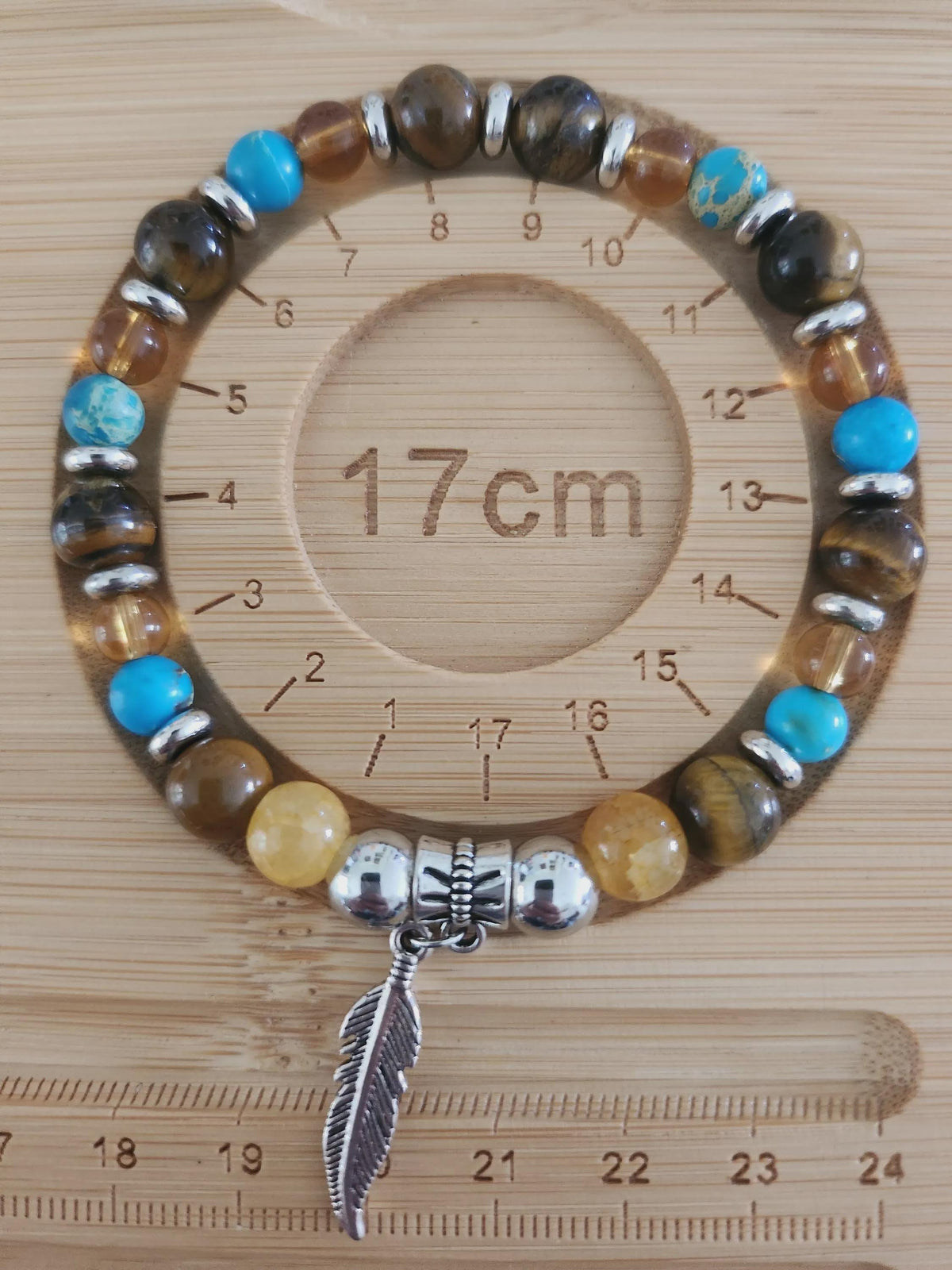 Bracelet fantaisie en perles Turquoise et Pendentif plume - gardien du ciel -
