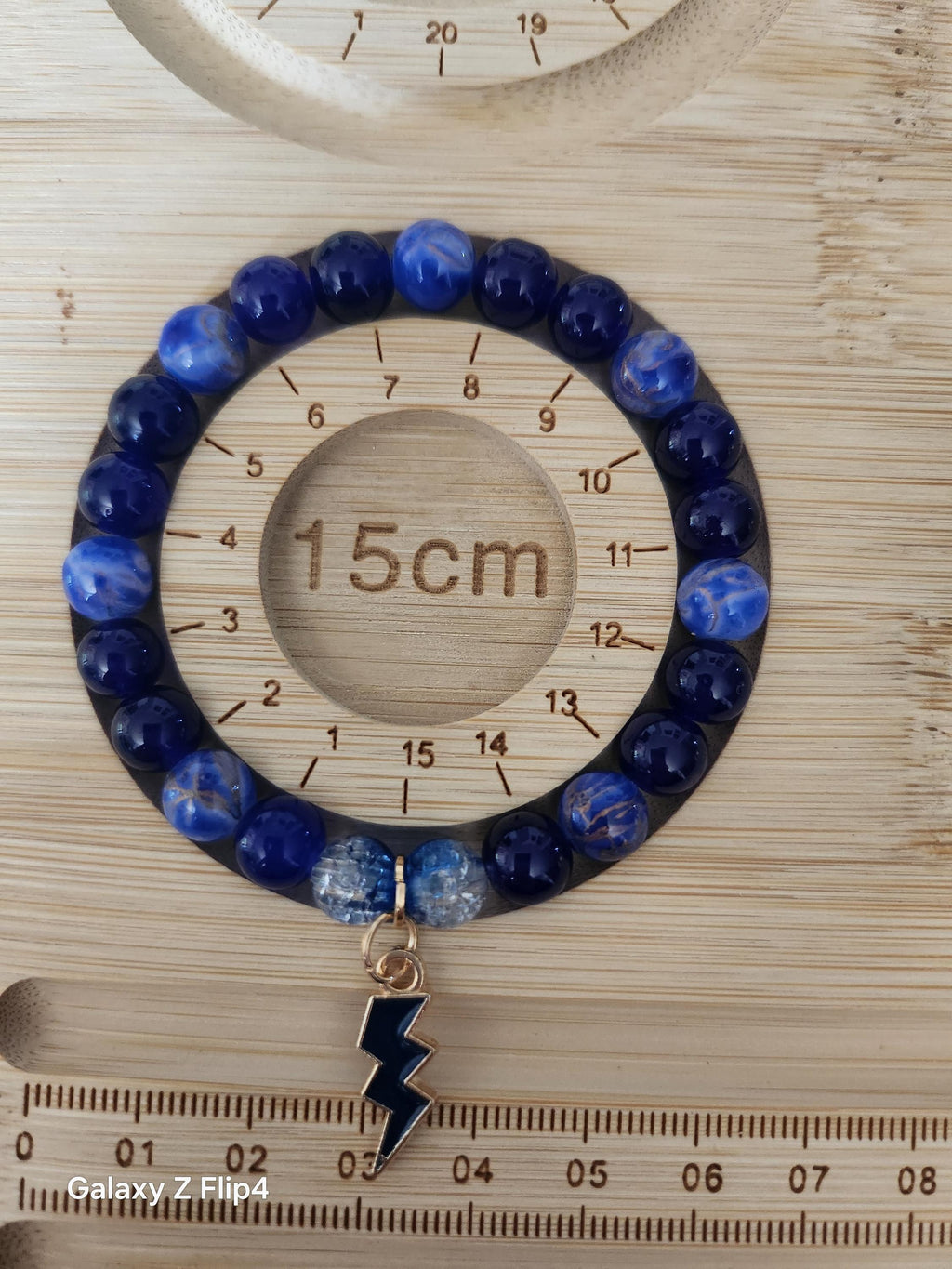 Cadeau Femme, Bracelet Perles Bleues Élastique avec Pendentif Éclair Neptune