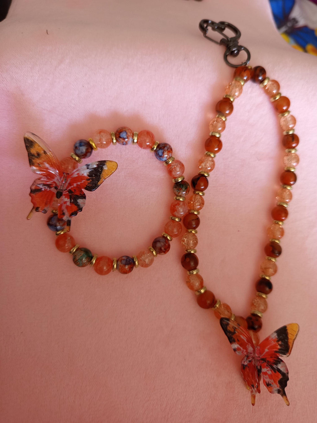 Ensemble bracelet et grigri de sac - couleurs différents rouges  avec papillon - Aile de Braise -