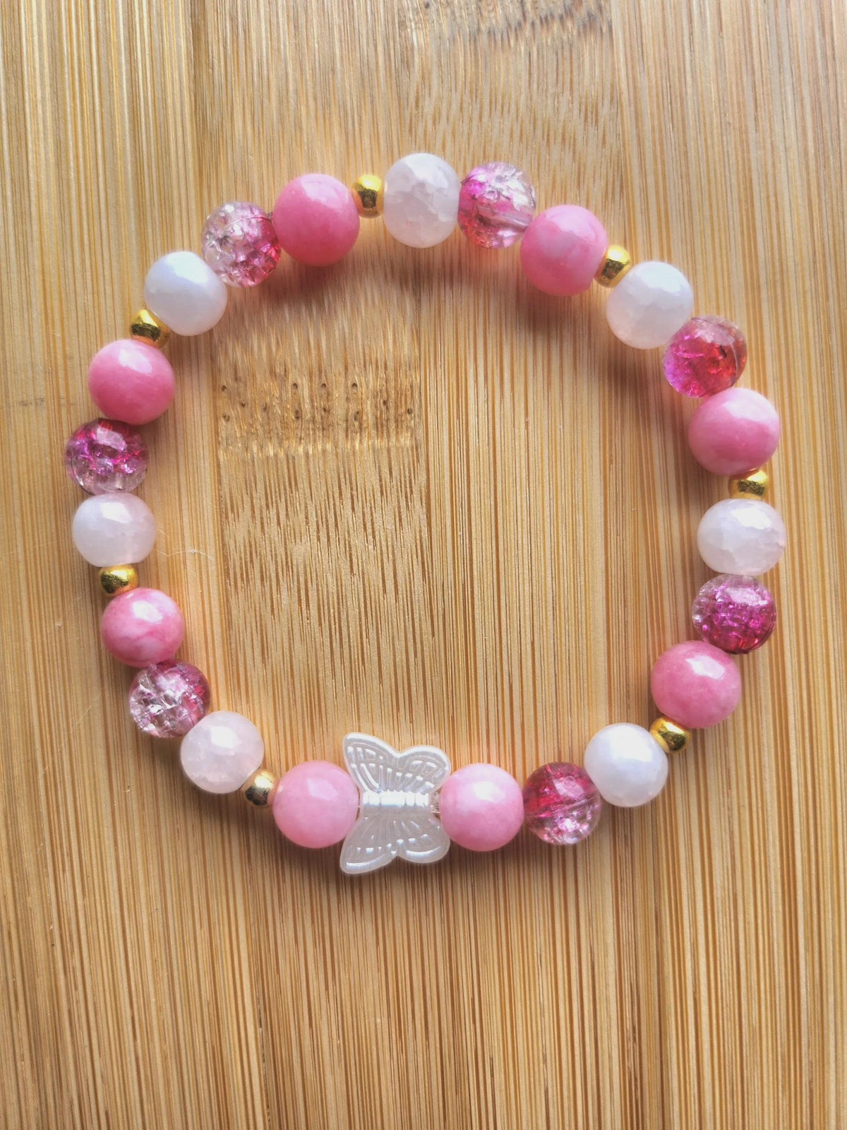 Bracelet fantaisie en  Perles Roses et Papillon Central - Œillet -