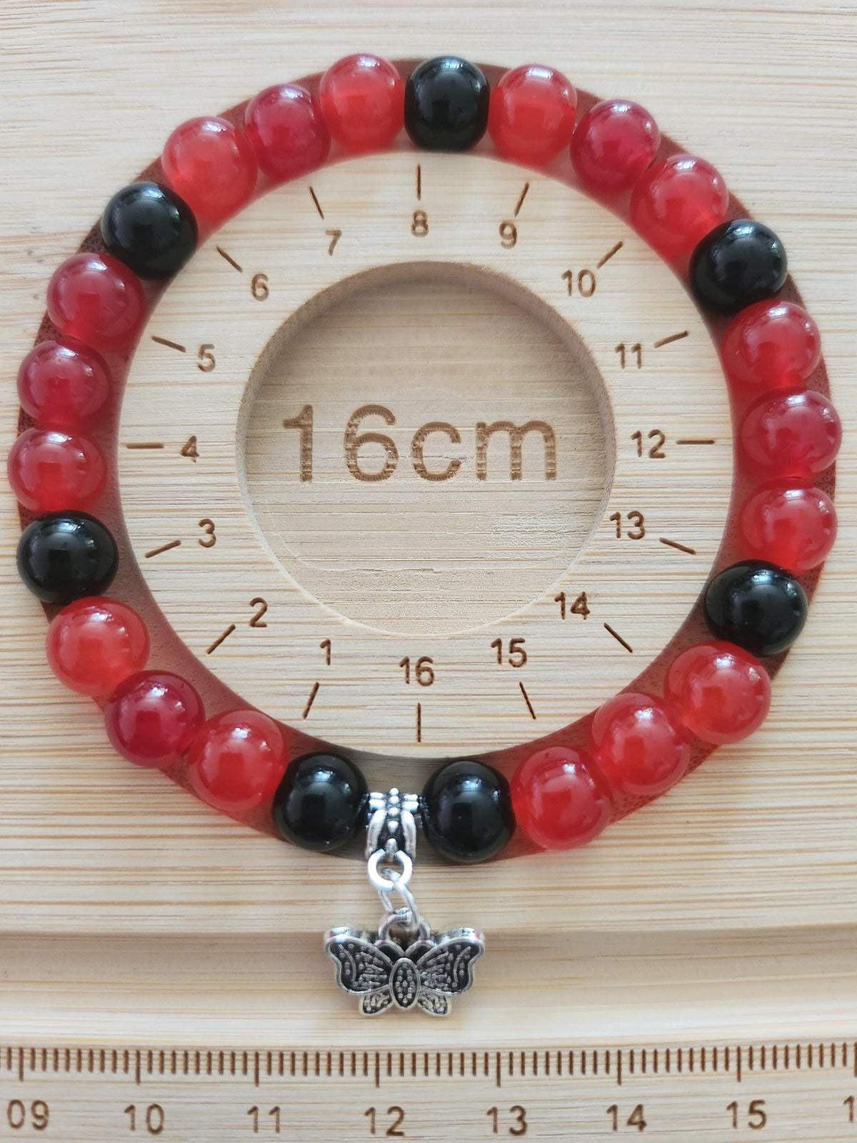 Ensemble Stylo & Bracelet en perles fantaisie  Rouges et Noires, Papillon Argenté - Coque-Licot,