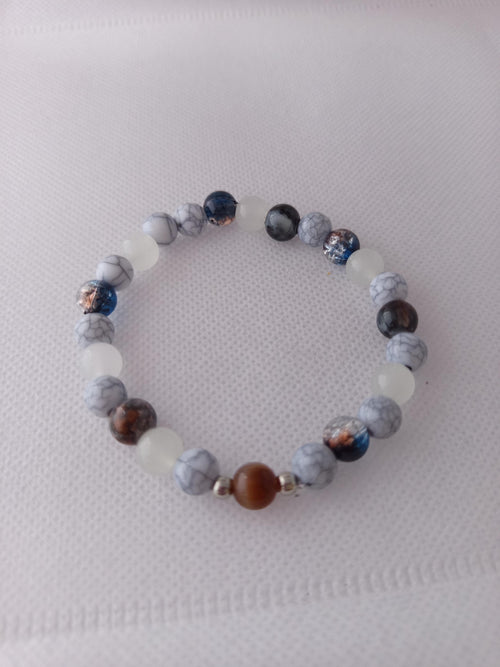 Bracelet en perles verre grises, blanches, noires, marrons et cuivrées