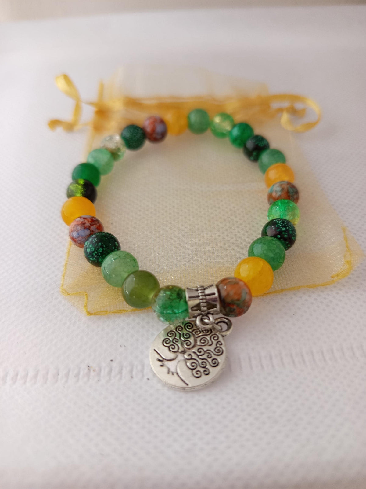 Cadeau femme, bracelet fantaisie à perles vertes, jaunes et orangées, arbre de vie